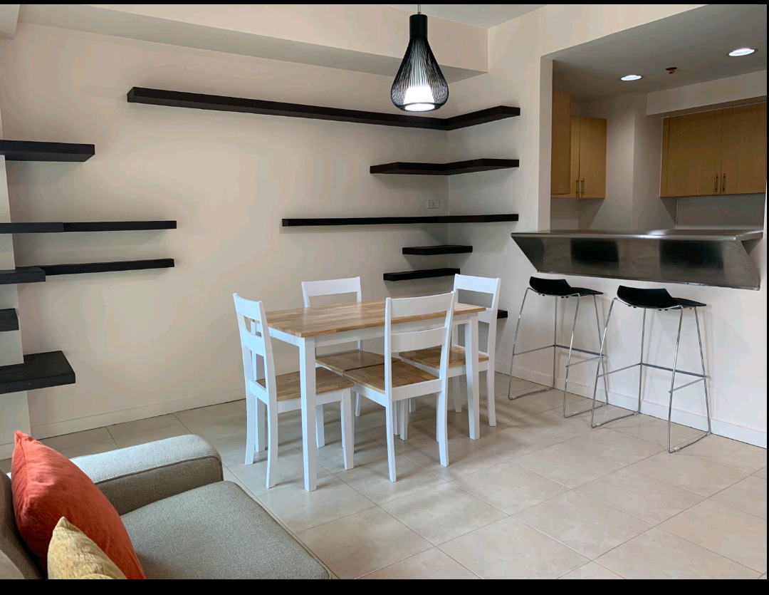 Two Serendra interiored One bedroom furnished unit with balcony for rent
