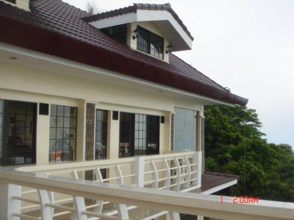 view of the living room and kitchen area from the balcony