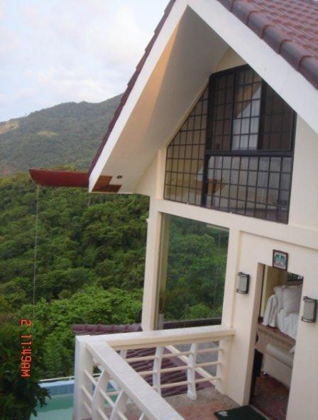 view from the rear side of the house (theres a small gate with stairs from the tee off area of golf course--instant access to the house)
