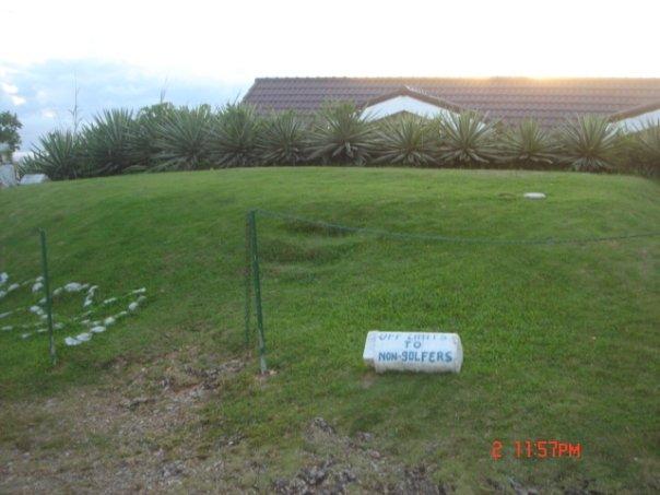 the tee off area (house roof is seen at the background)